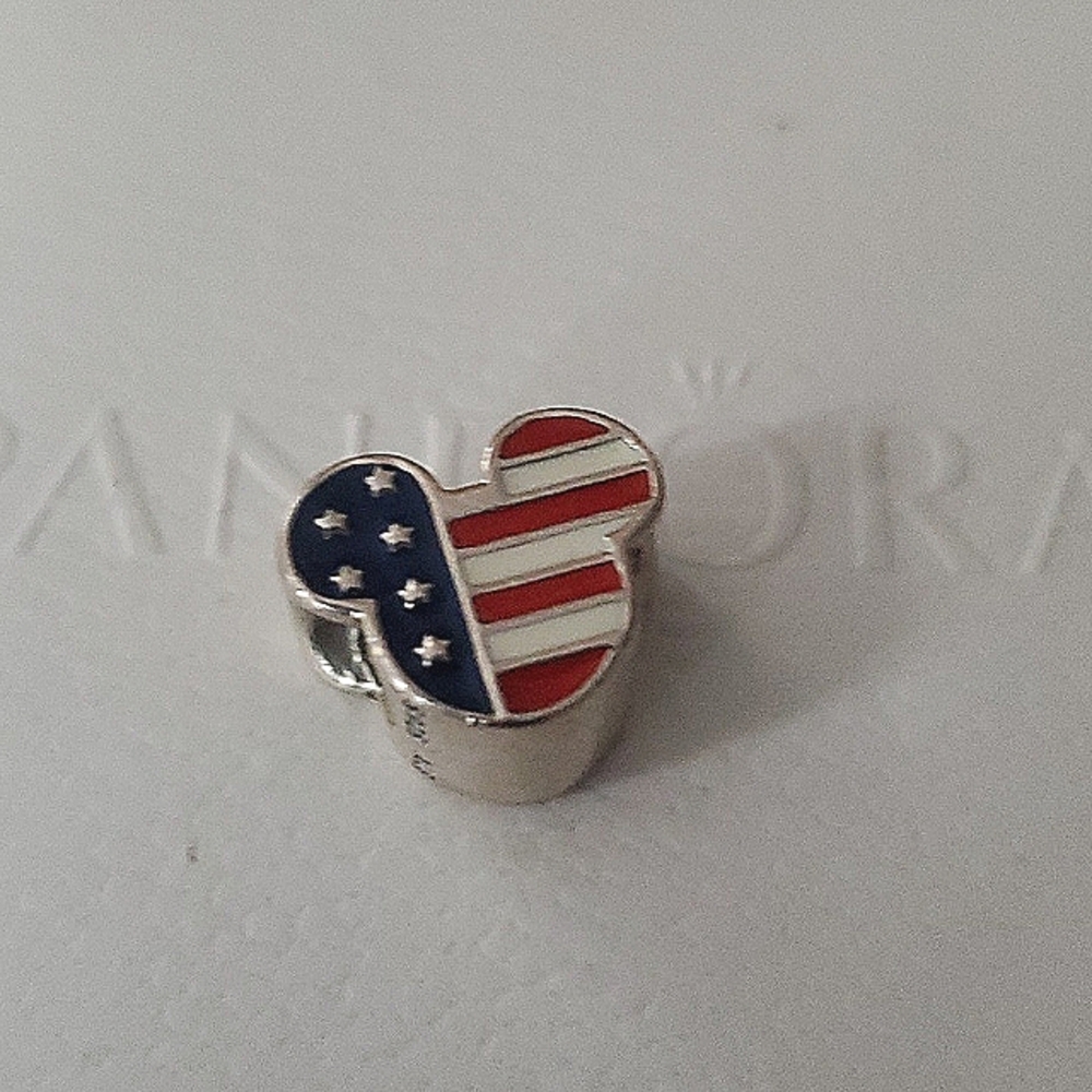 Authentic Pandora Disney charm.